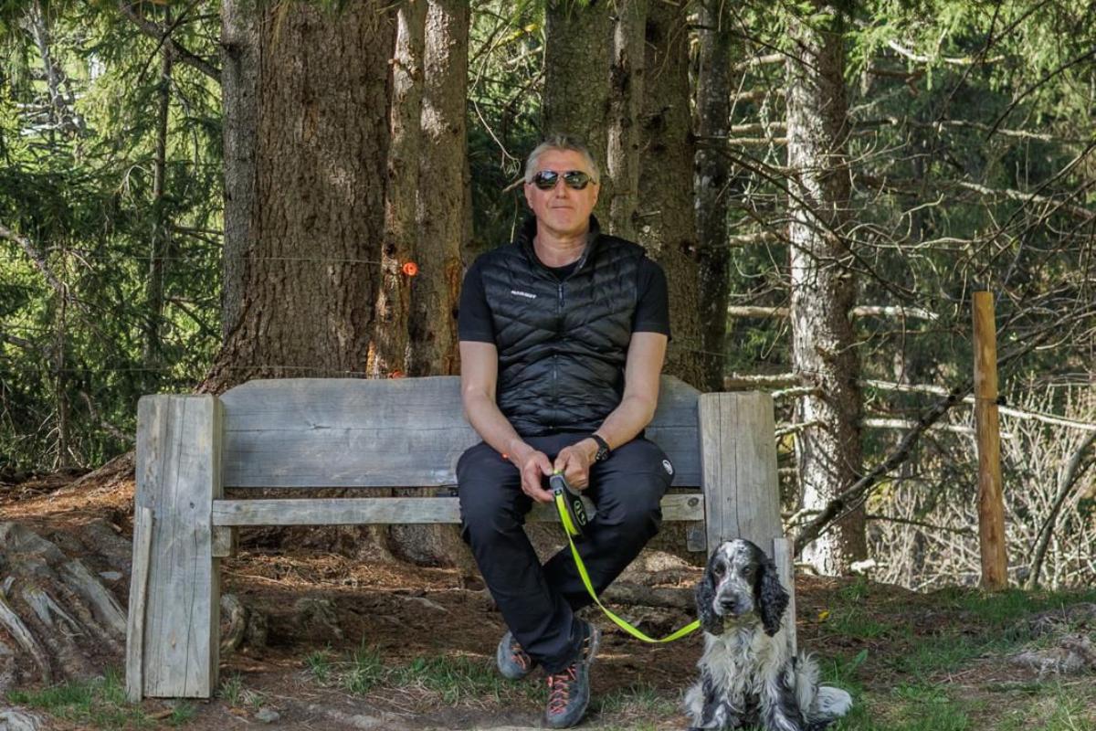 James Wilson in Wengen, Switzerland, with a dog